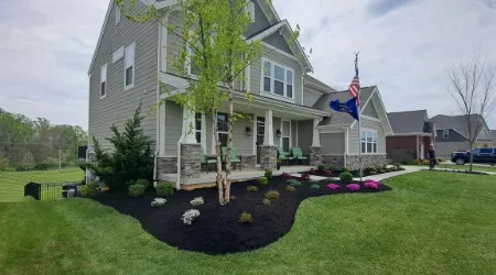 Medium sized property with fresh mulch installed.